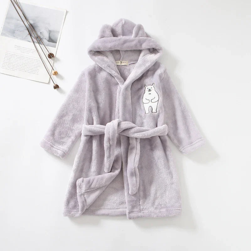 Soft lavender hooded children's bathrobe with bear embroidery and tie belt on white background