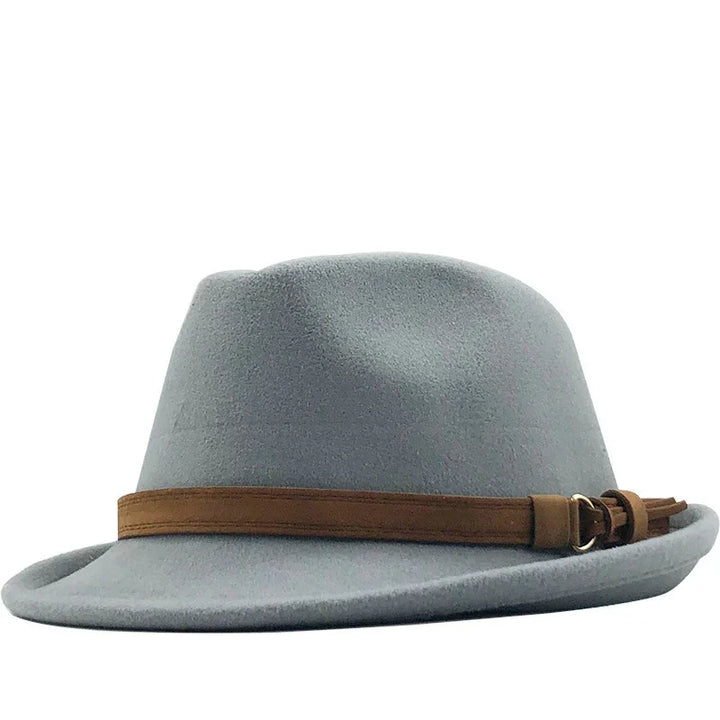 Gray felt fedora hat with brown leather band and buckle detail, isolated on white background