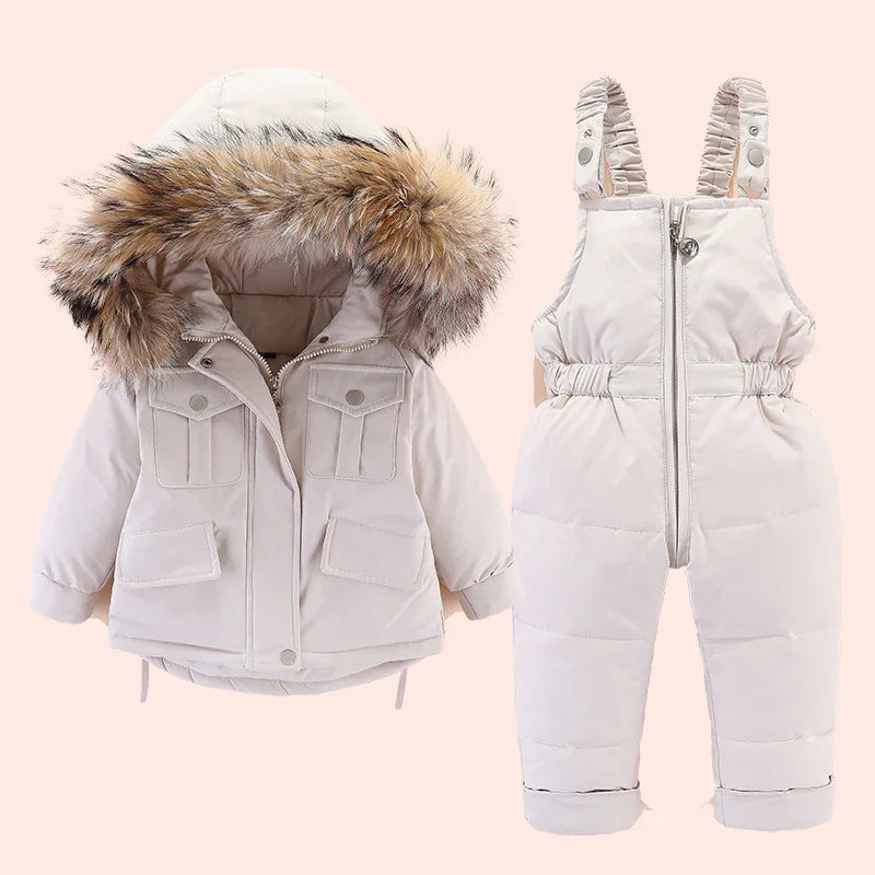 Beige toddler winter jacket with faux fur hood and matching insulated bib snow pants