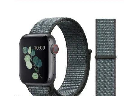 Smartwatch with digital display showing 10:09 and green leaf on screen, grey woven nylon band