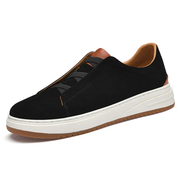 Black casual sneaker with white sole and brown inner lining and heel detail