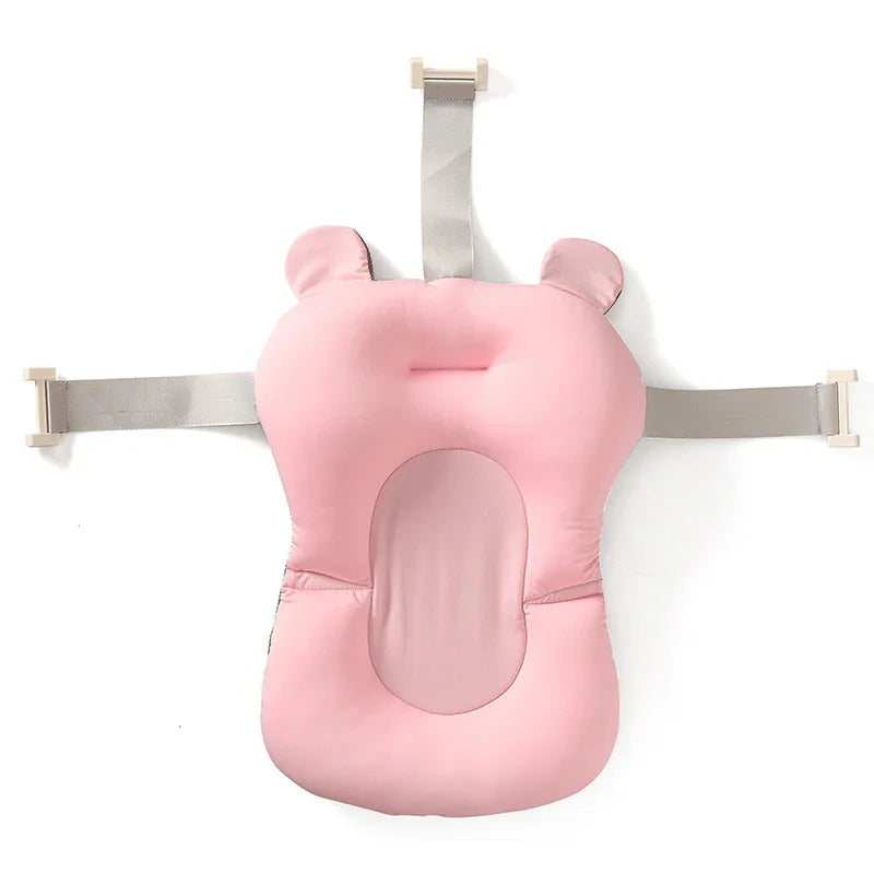 Pink baby bath seat with bear ears and adjustable straps for infant safety and comfort