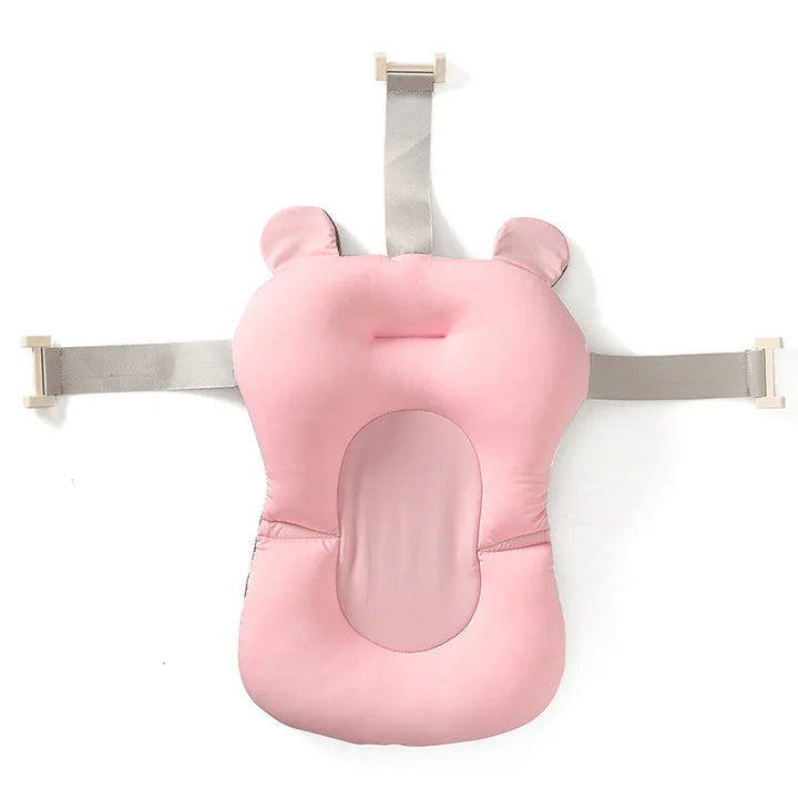 Pink baby bath seat with bear ears and adjustable straps for infant safety and comfort