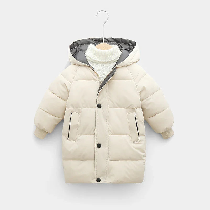 Cream padded children’s winter coat with hood and front pockets on hanger