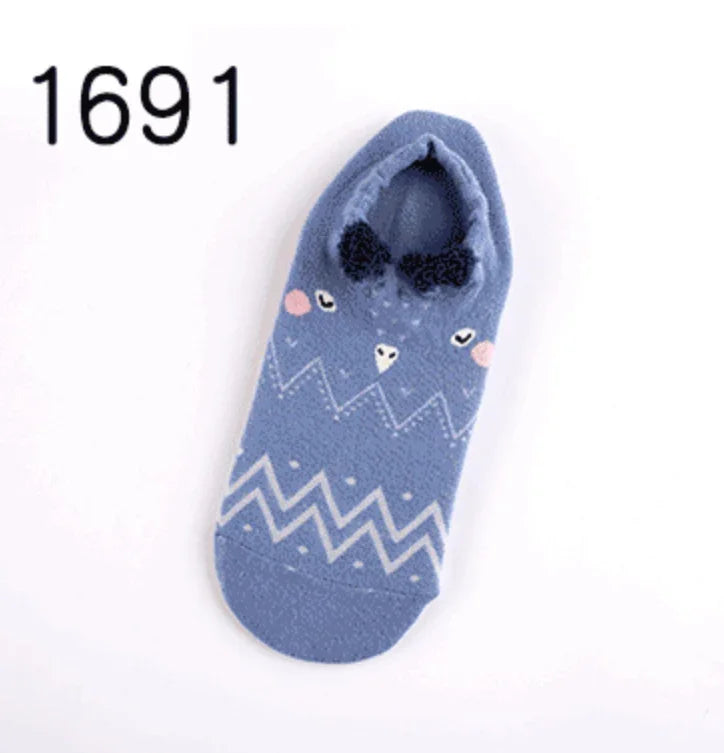 blue patterned ankle sock with bird face design and black bow detail