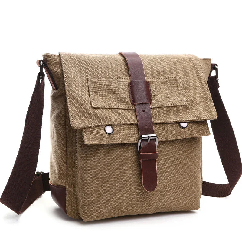 Khaki canvas messenger bag with brown leather strap and adjustable shoulder strap