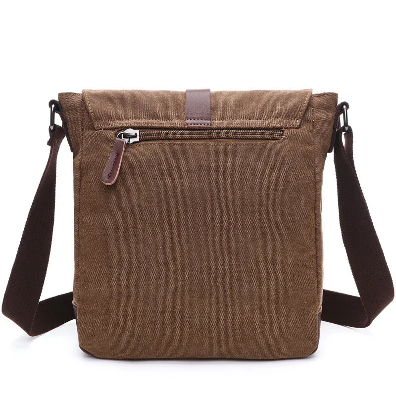 Brown canvas crossbody messenger bag with front zipper pocket and adjustable strap