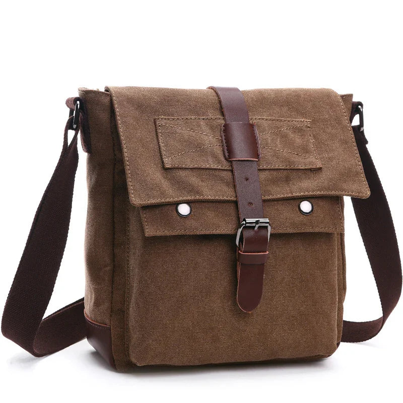 brown canvas crossbody messenger bag with leather buckle and adjustable strap on white background