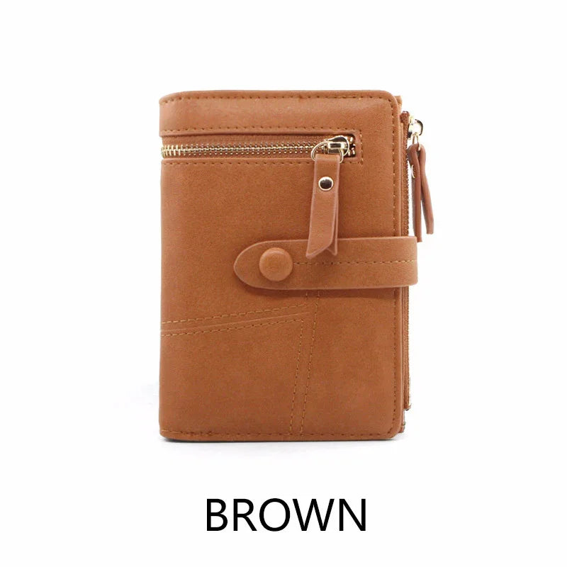 Brown leather wallet with front zipper pocket and snap button strap closure