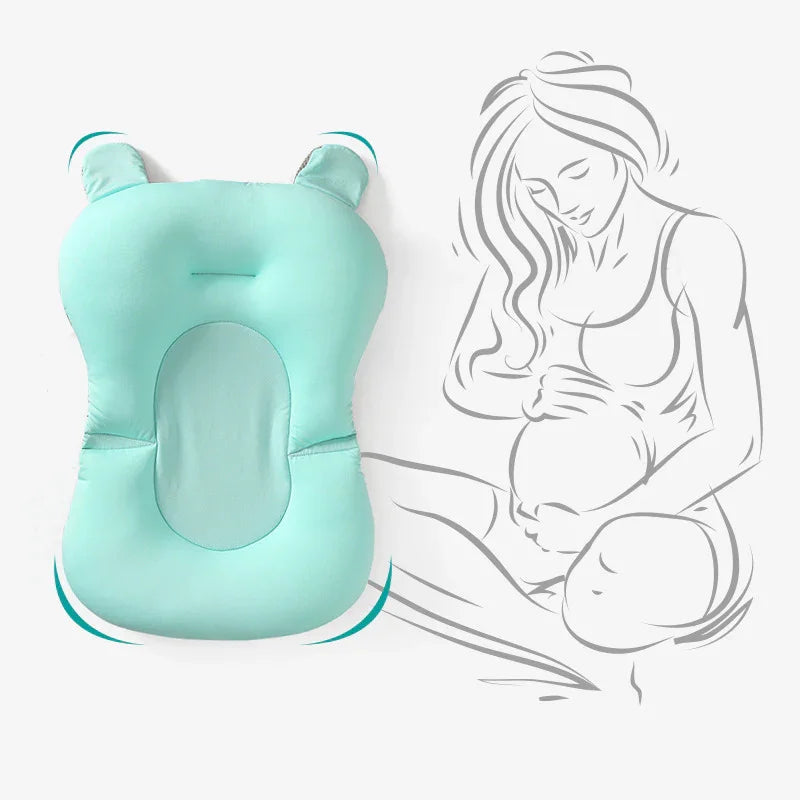 Light blue ergonomic baby head shaping pillow with breathable center and bear ears, beside sketch of pregnant woman