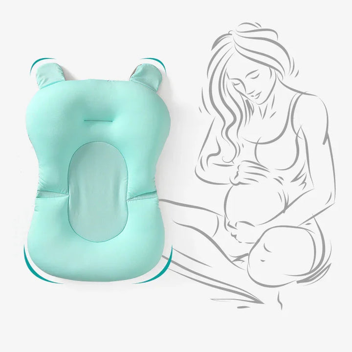 Light blue ergonomic baby head shaping pillow with breathable center and bear ears, beside sketch of pregnant woman