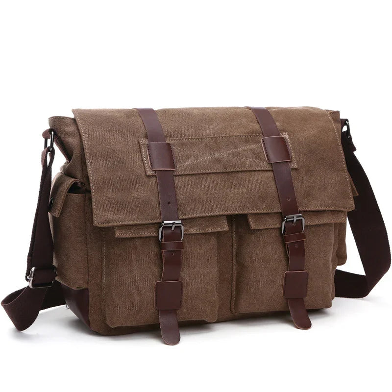 Brown canvas messenger bag with two front pockets and adjustable leather straps on white background