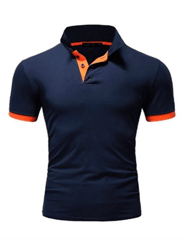 Men's navy blue polo shirt with orange collar lining and sleeve cuffs, button-up collar