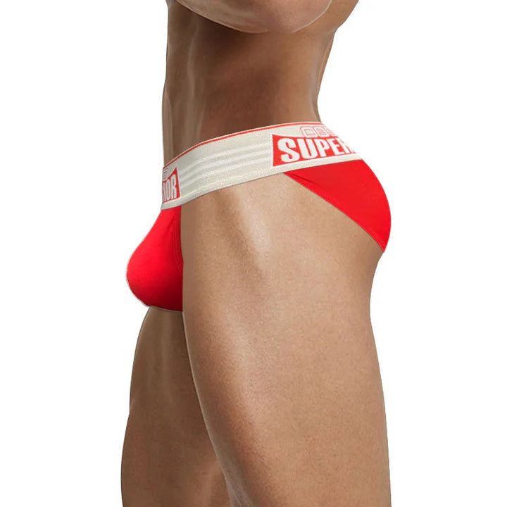 Side view of a man wearing red Superdry underwear with a white branded waistband
