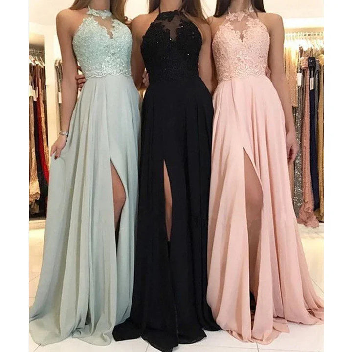 Three women wearing elegant sleeveless floor-length dresses in pastel green, black, and pink with lace bodices and thigh-high slits