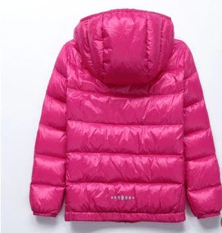 Bright pink puffer jacket with hood and horizontal quilted stitching on white background