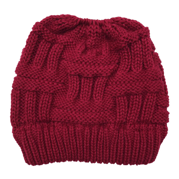 Red chunky knit beanie hat with textured cable knit pattern and ribbed brim