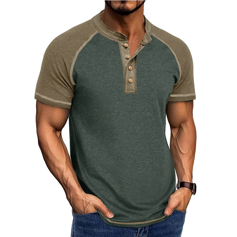 muscular man wearing green and brown short-sleeve henley t-shirt with wooden buttons and jeans