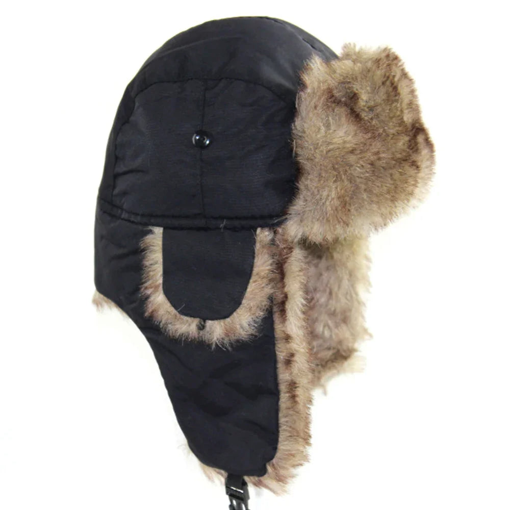 Black winter trapper hat with brown faux fur lining and ear flaps against white background