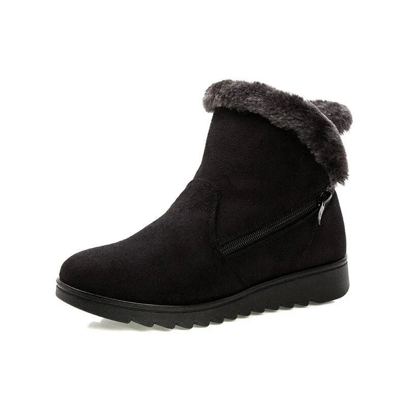 Black suede winter ankle boot with faux fur collar and side zipper on white background