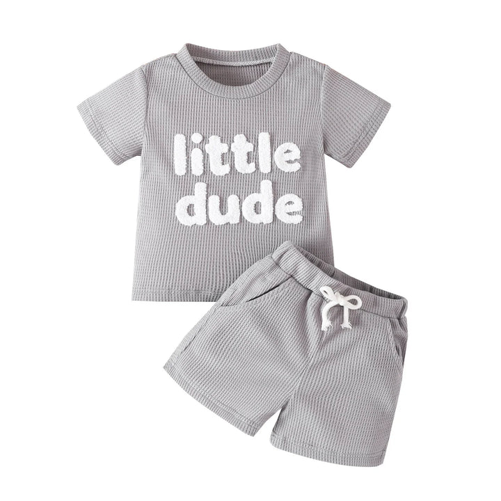 Gray toddler short-sleeve shirt with "little dude" text and matching shorts with drawstring