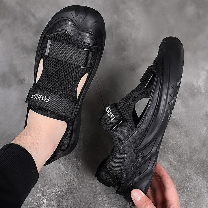 Black mesh breathable sandals with thick sole and FASHION strap on gray floor