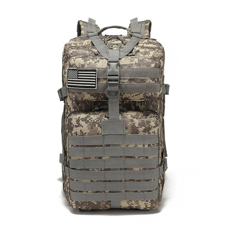 Digital camo tactical backpack with American flag patch and MOLLE webbing, front view