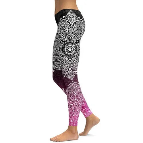 Women wearing black to pink ombre leggings with intricate white mandala patterns, standing barefoot