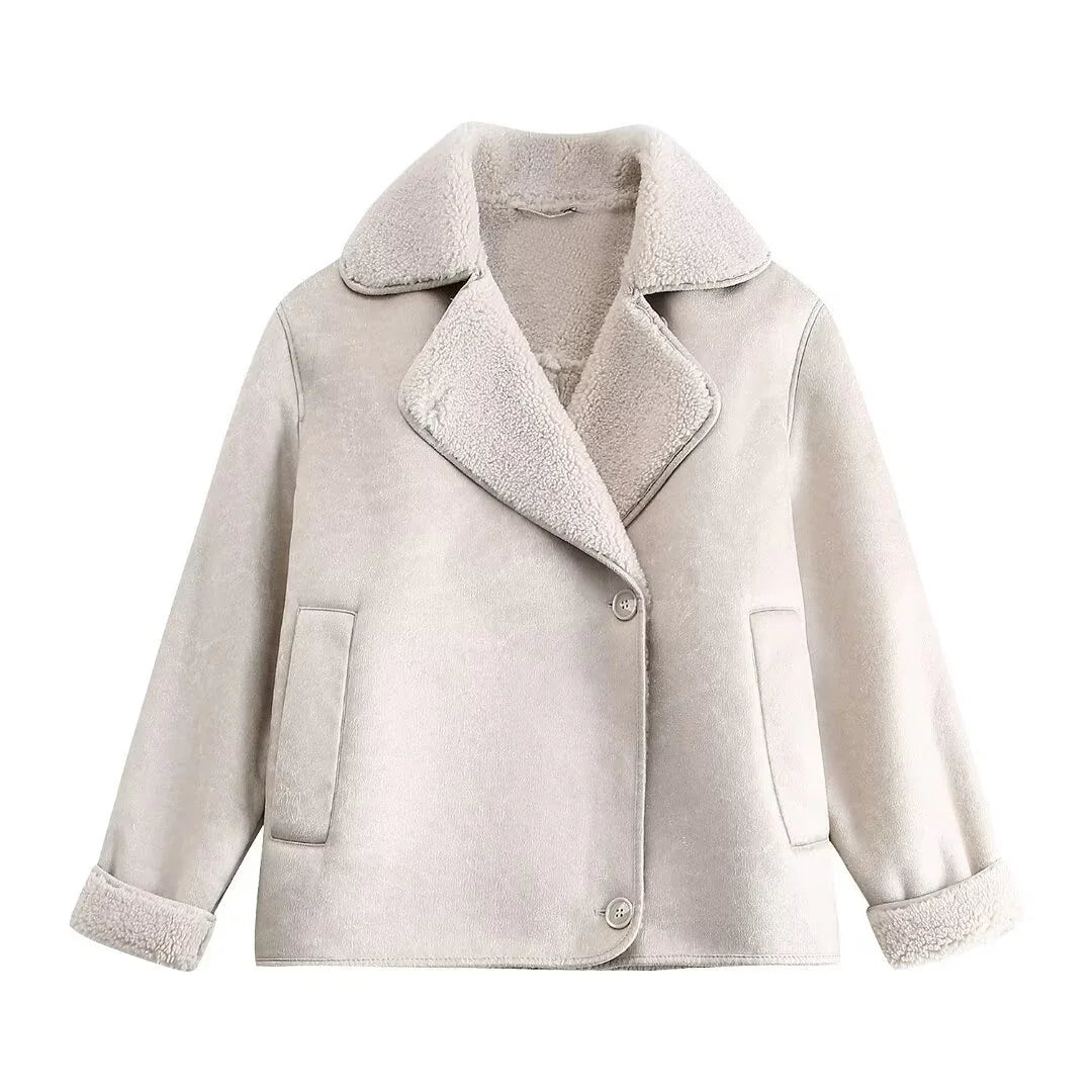 Light beige shearling jacket with plush collar, button closure, and front pockets