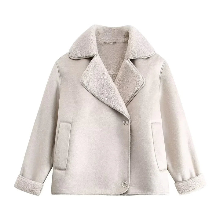 Light beige shearling jacket with plush collar, button closure, and front pockets