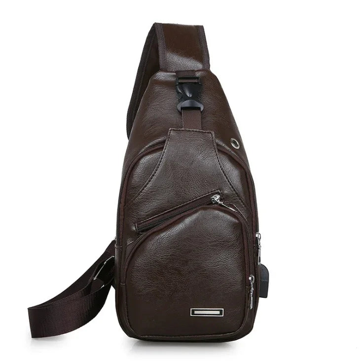 Dark brown leather sling backpack with multiple zipper pockets and adjustable strap