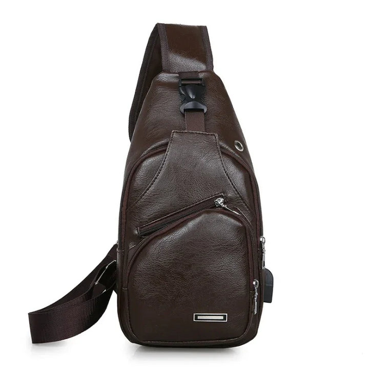 Dark brown leather sling backpack with multiple zipper pockets and adjustable strap