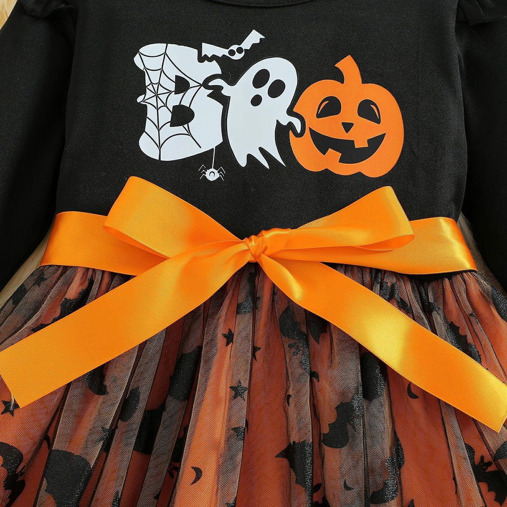 Halloween dress with black top featuring ghost, spider, pumpkin print and orange bow, orange tulle skirt