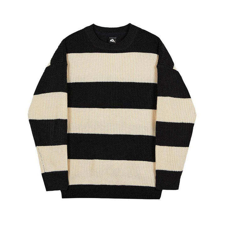 Black and cream striped knit sweater with long sleeves and crew neck