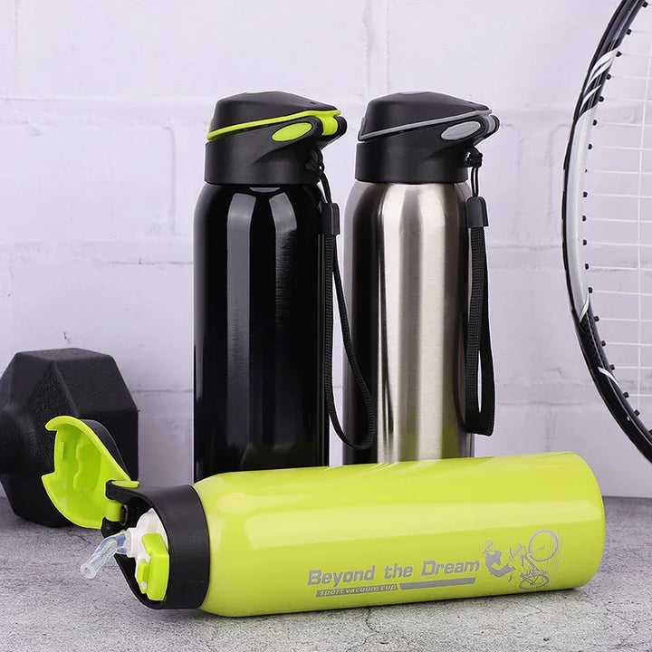 Three sports water bottles with flip lids, next to a dumbbell and tennis racket on a gray surface