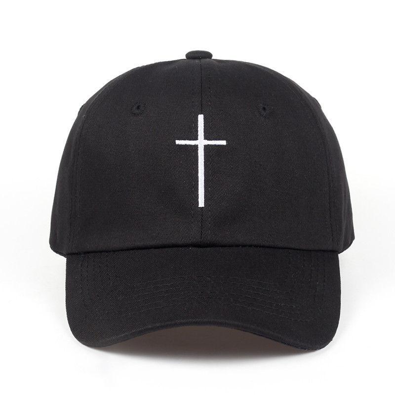 Black baseball cap with white embroidered vertical cross on front