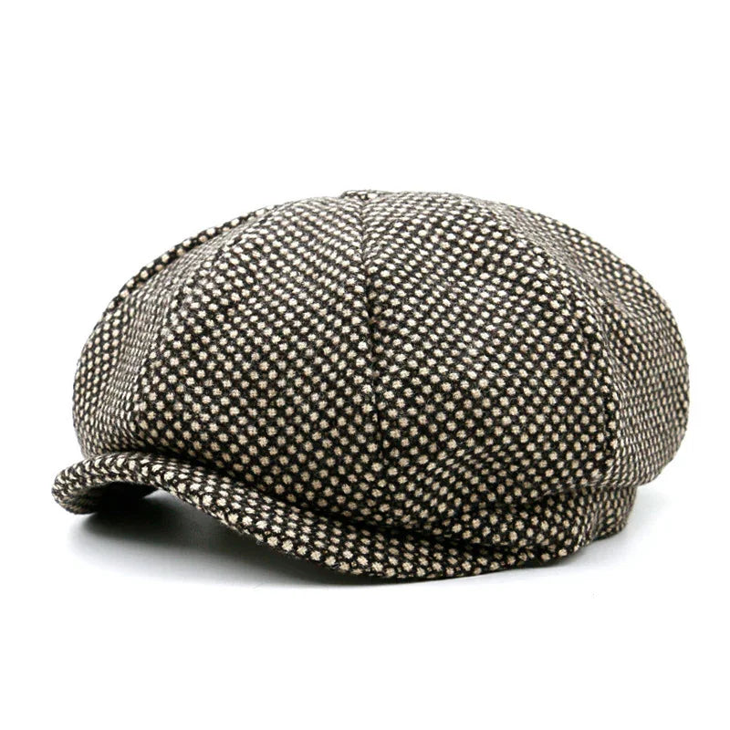 Brown and beige checkered newsboy cap with a curved brim on white background