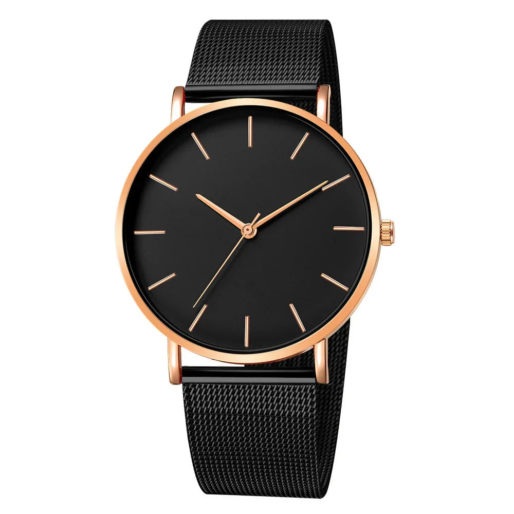 Black minimalist wristwatch with rose gold case and markers, black mesh strap