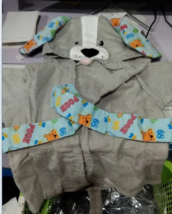 Gray toddler hooded towel with dog face and long ears featuring colorful cartoon bear prints and the word Pooh