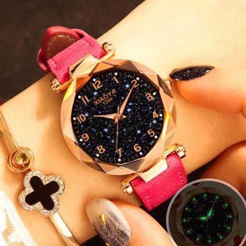 Fashion wristwatch with faceted rose gold case, sparkle black dial, pink leather strap on wrist