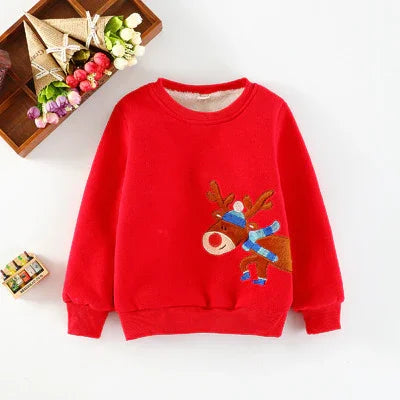 Red Christmas kids sweater with cute reindeer wearing a blue scarf and hat, displayed on white background
