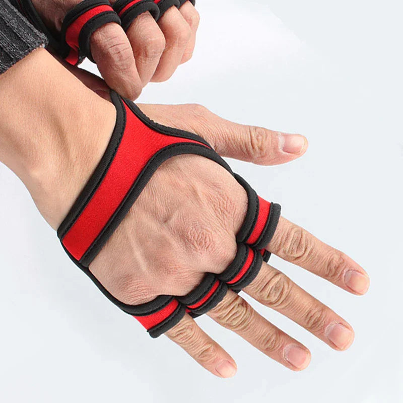 Person wearing red and black fingerless sports gloves on one hand against a light background