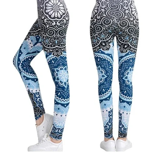 Women's high-waisted leggings with blue and black mandala and paisley patterns, worn with white sneakers