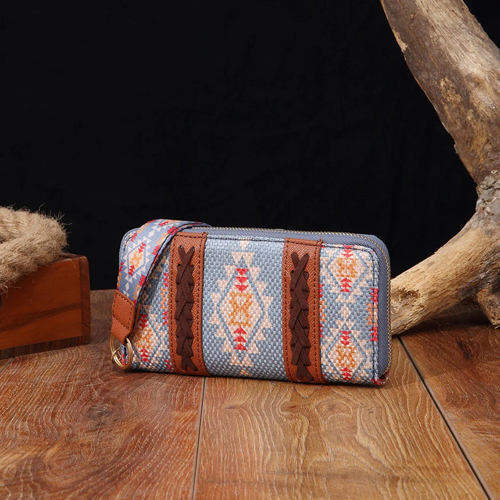Bohemian style zippered clutch wallet with geometric tribal pattern and braided leather accents