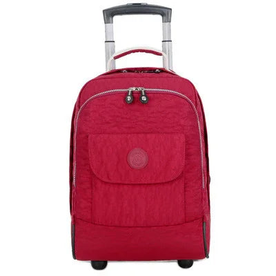 Red wheeled carry-on luggage with front pocket and retractable handle