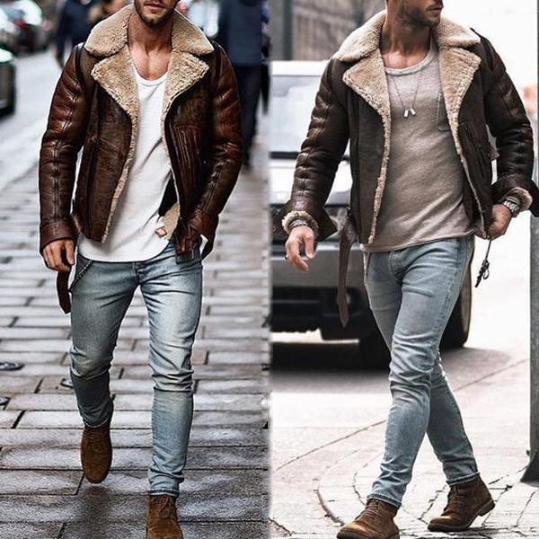 Men wearing brown shearling leather jackets paired with light blue jeans and brown boots walking outdoors