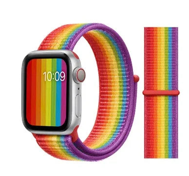Smartwatch with vibrant rainbow nylon sport loop band and matching extra strap for pride support
