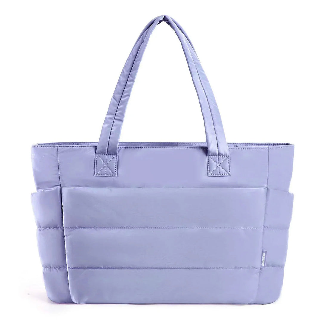 Light purple padded tote bag with double handles and side pockets on white background