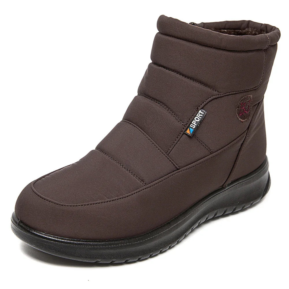Brown insulated sport winter boot with black rubber sole and quilted design