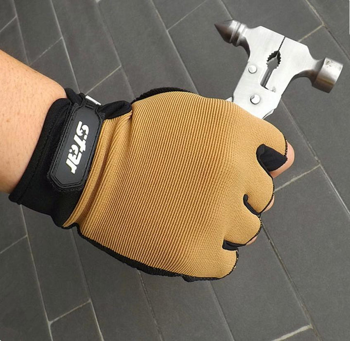 Hand in tan work glove holding multifunctional hammer tool on tiled floor